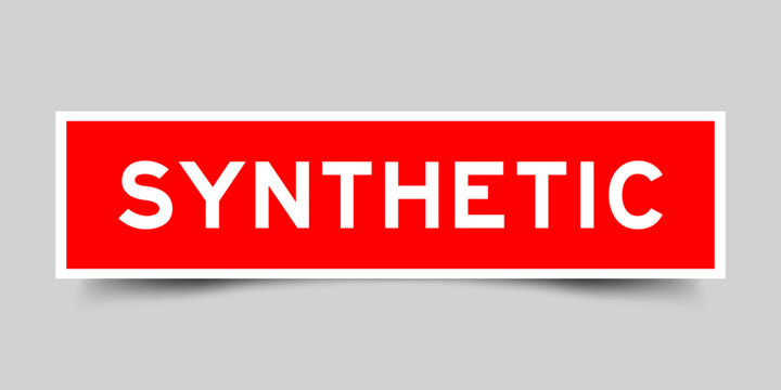 Red color square shape sticker label with word synthetic on gray background