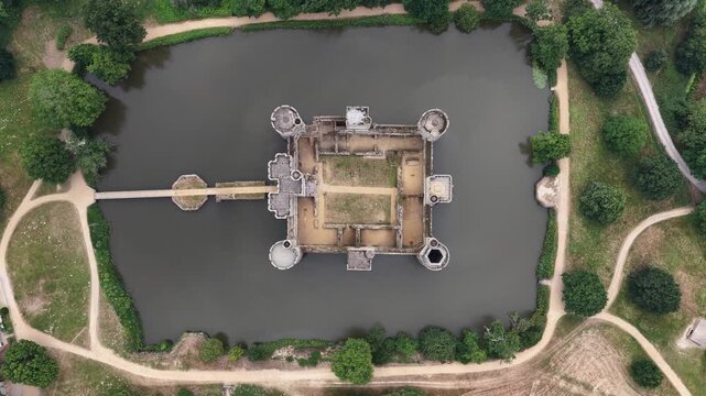 Aerial view of Bodiam Castle surrounded by a moat in England during the day