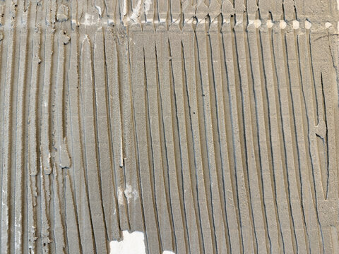 Close Up Cement Adhesive Grooves