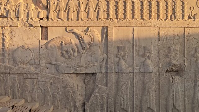 Cinematic slow motion view of ancient Persepolis stone relief in Iran
