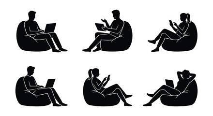Obraz premium Silhouettes of people using laptops and phones while relaxing on bean bags.