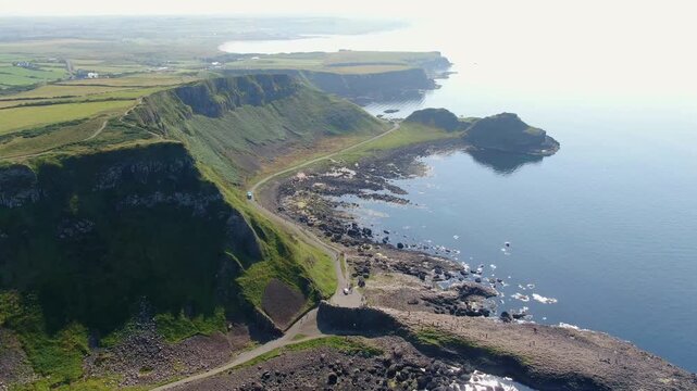 Spectacular aerial view of the iconic Giant's Causeway coastline in Northern Ireland. Drone Video of basalt columns, cliffs and Atlantic Ocean, and breathtaking coastal scenery