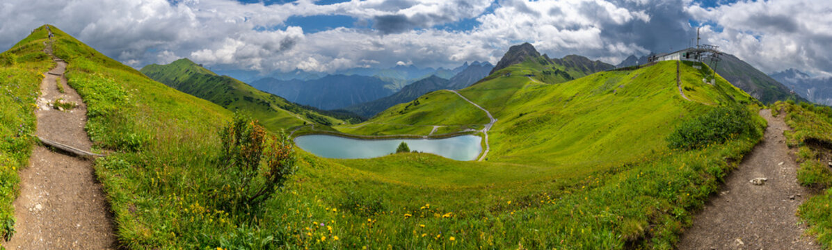 the summit called "Gehrenspitze" in the little valley of Walser, Austria on a cloudy summer day. tightrope under changing weather. holiday destination for hiker and climber and in winter skiing