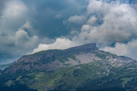 the summit called "Hoher Ifen" in the little valley of Walser, Austria on a cloudy summer day. hiker walked up under changing weather. holiday destination for hiker and climber and in winter skiing
