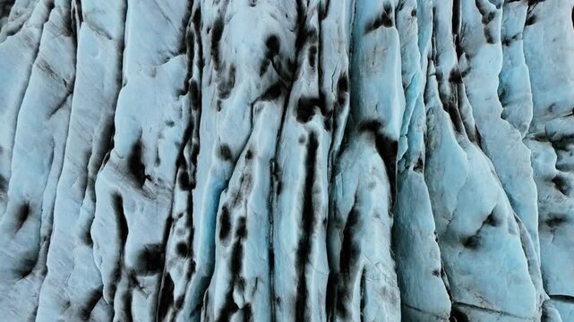 Aerial Drone Vertical Ice Ridges Glacier Face Iceland Abstract Cinematic