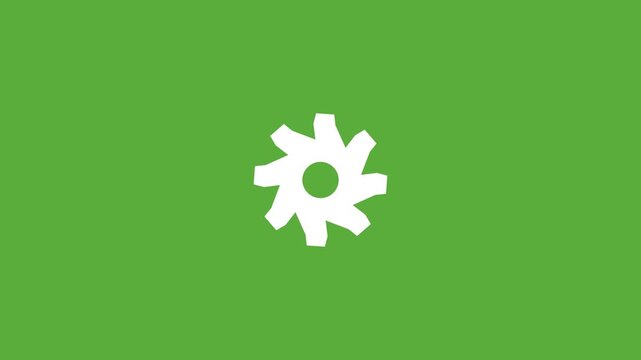 white spinning settings gear icon on a solid green background
