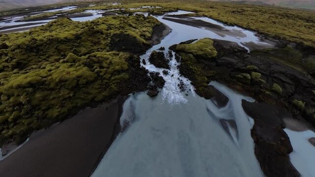 Aerial Drone Cinematic Circle Reveals Iceland River Mini Waterfall Moss Landscape 