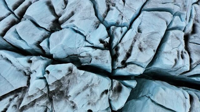 Top Down Aerial Glacier Crevasse Ice Texture Abstract Iceland Drone Overhead