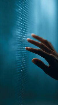 Cyberpunk-style hand near pixelated data wall