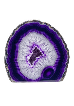 extreme macro shot of a polished amethyst geode slice with complex purple and white concentric bands and sparkling druzy cavity, isolated on high-key background. Concept of perfection nature and