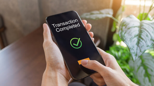 Woman using smartphone online shopping and payment via mobile banking apps. financial technology, Digital banking network, internet payment and digital wallet, Buy now pay later concept.