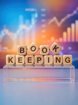 Wooden Blocks Spelling Bookkeeping with Financial Chart Background.