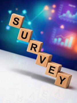 Wooden Blocks Spelling Out Survey on a Blurred Digital Background.
