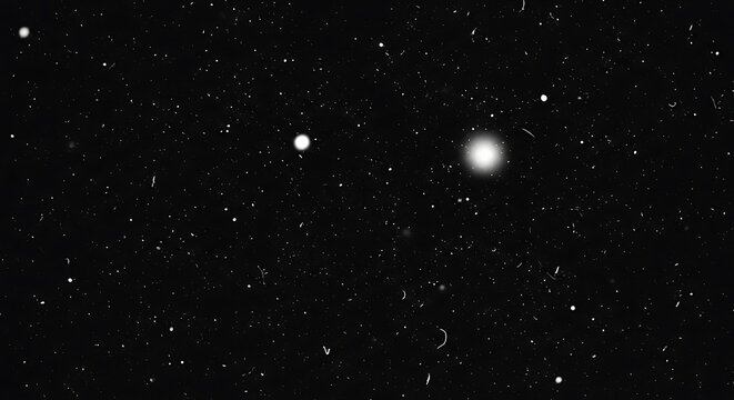 A grainy, monochromatic image of a starry night, with bright celestial bodies and cosmic dust