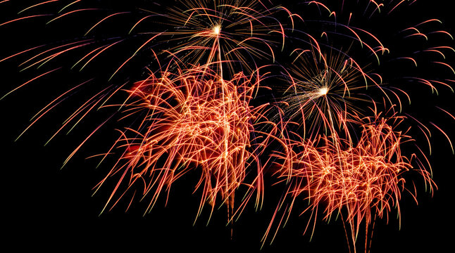Set of colorful fireworks on black background.