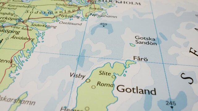 Gliding over the Baltic Sea from Gotland to Stockholm on an atlas map