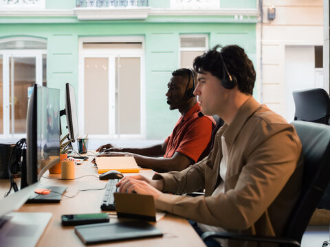Focused men working at customer support service 