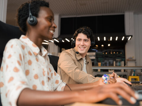 Working Together at a Call Center in a Busy Office Space