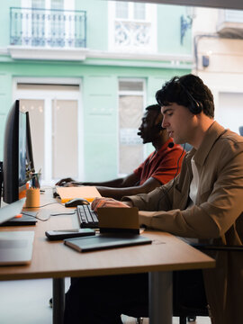 Diverse men working at customer care service team 