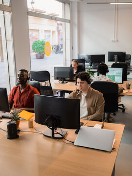 Diverse people working at customer service office