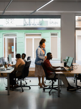 Supervisor controlling call center workers 
