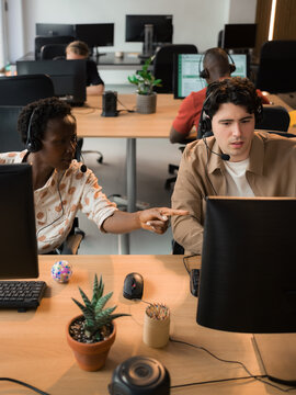 Team Members Collaborate in an Office During Work Hours