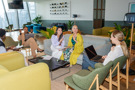 Group of People Having a Meeting in a Modern Office Space
