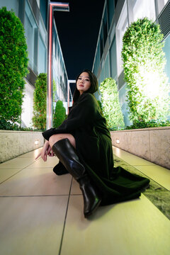 Japanese woman posing urban fashion night Tokyo