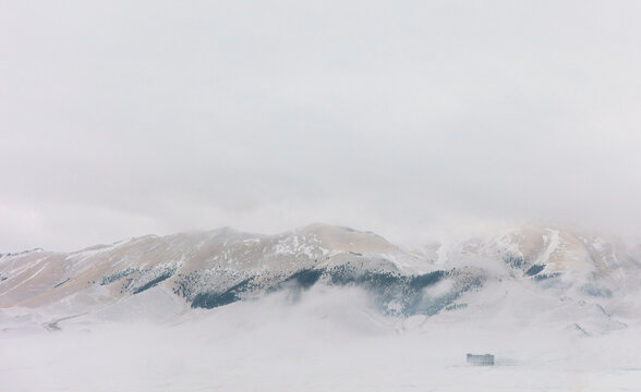 Misty Winter Mountains and a Solitary Hotel.