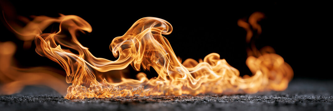 Flowing flames dancing across a dark surface, creating a mesmerizing display.