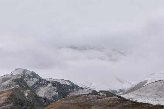 Plateau Rock Strata and Cool Tones Weathered by Wind and Snow.