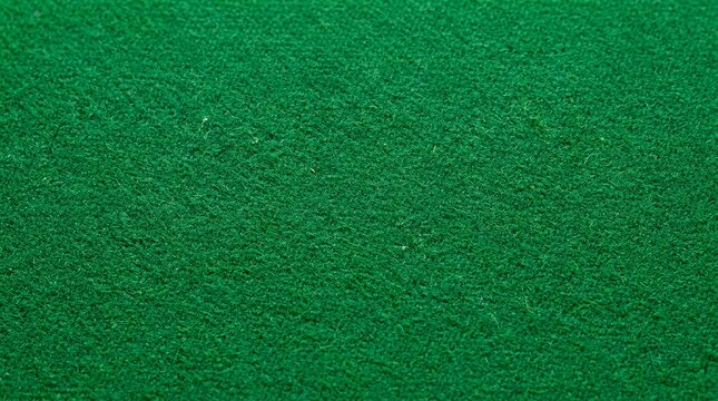 Macro photograph of vibrant green felt pool table fabric surface texture detailed view of classic cue sports billiard cloth textile background  green billiard cloth texture felt pool table