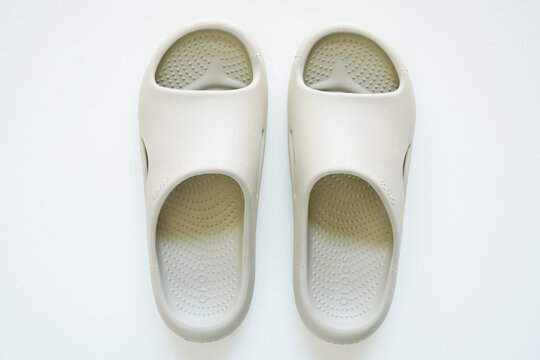Overhead view of Crocs Mellow Recovery Slide sandals arranged forward-facing on a white background