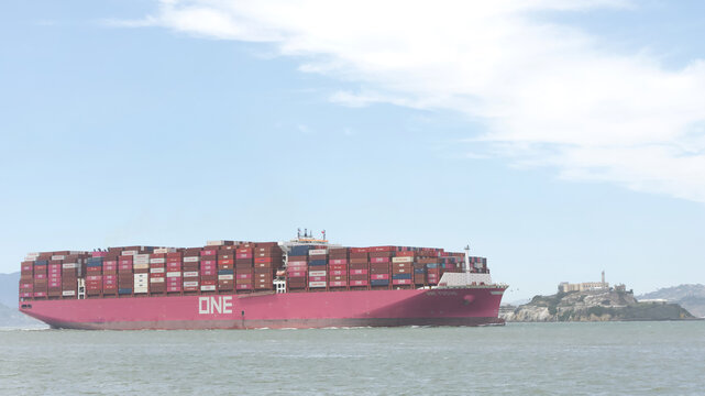 San Francisco, CA - July 12, 2026: Ocean Network Express cargo ship ONE FOCUS in the San Francisco Bay. Passing Alcatraz island