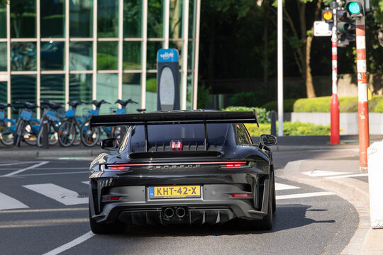 Luxembourg City, Luxembourg - June 22nd 2026 : View on a black Porsche 992 GT3 RS MkI Weissach Package driving on a street.