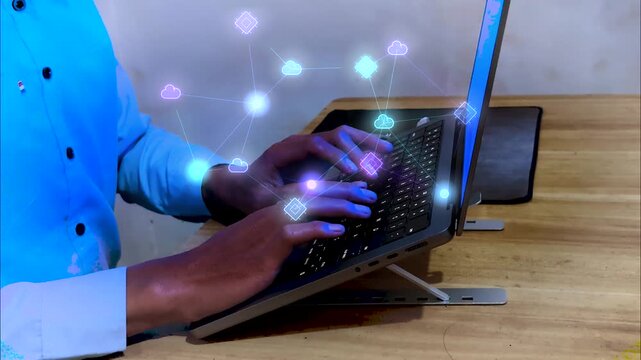 IT specialist typing laptop with connected cloud infrastructure visualization, representing enterprise networking, distributed system, cloud computing, data synchronization, and digital infrastructure