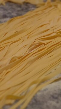 Close up fresh homemade linguini pasta. High quality FullHD footage