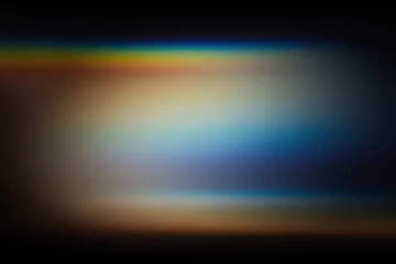 Abstract light leak forming horizontal rainbow spectrum with soft glow © colnihko