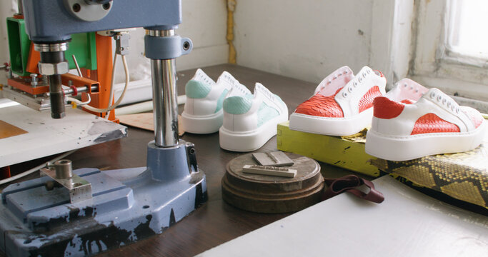 Shoe craft. Footwear production. Professional factory with sewing machine material handmade leather sneakers.