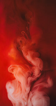 Paint bang. Smoke flow. Color water burst abstract fluid blur background. White drop soft curl spray explosion in red glossy liquid.