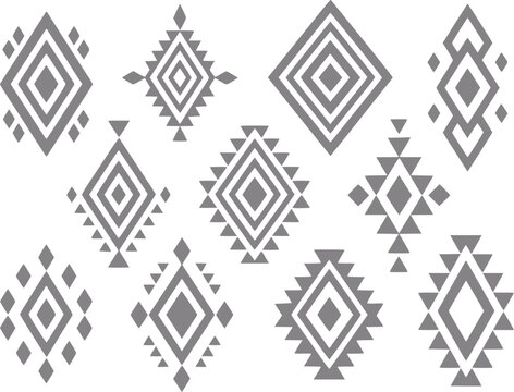 Una colecci&oacute;n de varias formas de diamantes geom&eacute;tricos grises y patrones inspirados en tribus aztecas sobre fondo blanco