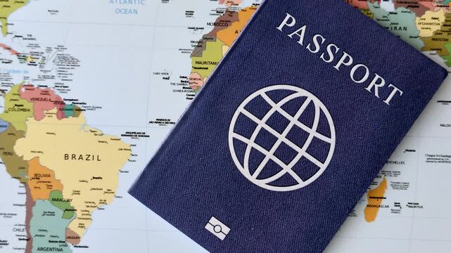 International passport against a map backdrop, representing the concepts of travel, hiking, and relocation. Passport on a map as a background for your design