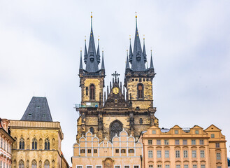 Fototapeta premium Close up view of the magnificent Gothic spires of the Church of Our Lady before Tyn in the UNESCO World Heritage site of Prague.