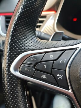 Adaptive Cruise Control and Lane Keeping Assist Buttons on a Modern Steering Wheel