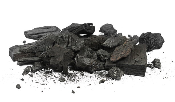 Charcoal chunks pile isolated on white background, side view, clipping path, design element