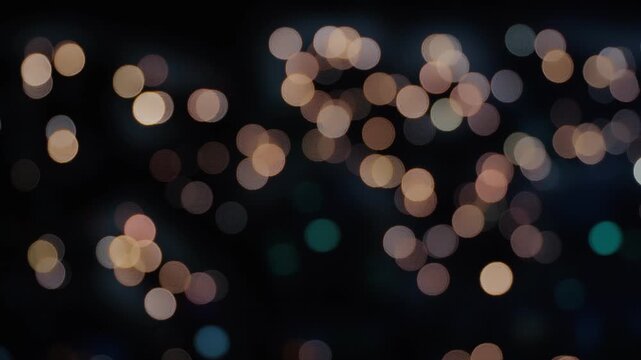 Abstract Defocused City Lights Bokeh Background at Night with Warm Glowing Circular Light Orbs and Dark Urban Blurred Backdrop