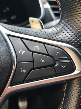 Steering Wheel Control Buttons in a Modern Car &ndash; Automotive Technology Concept