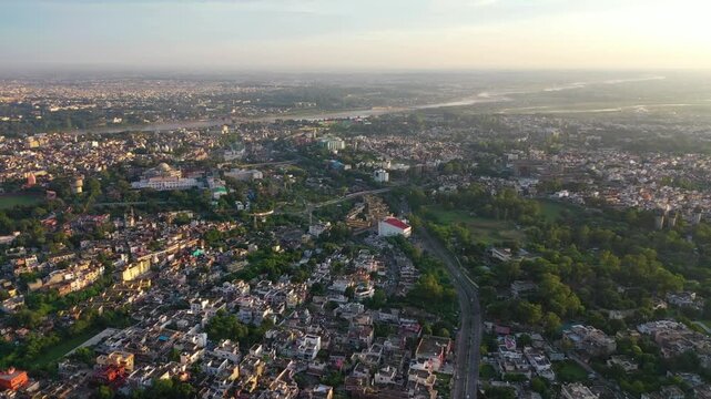 Jammu city sunset establishing shot over dense urban residential houses.