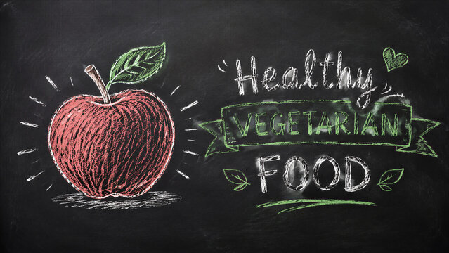Chalkboard apple illustration with healthy vegetarian food text