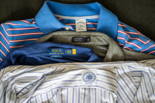 Norfolk Virginia - July 19 2026: Tags of Different Ivy Style Brands on Shirts that are Popular for Men